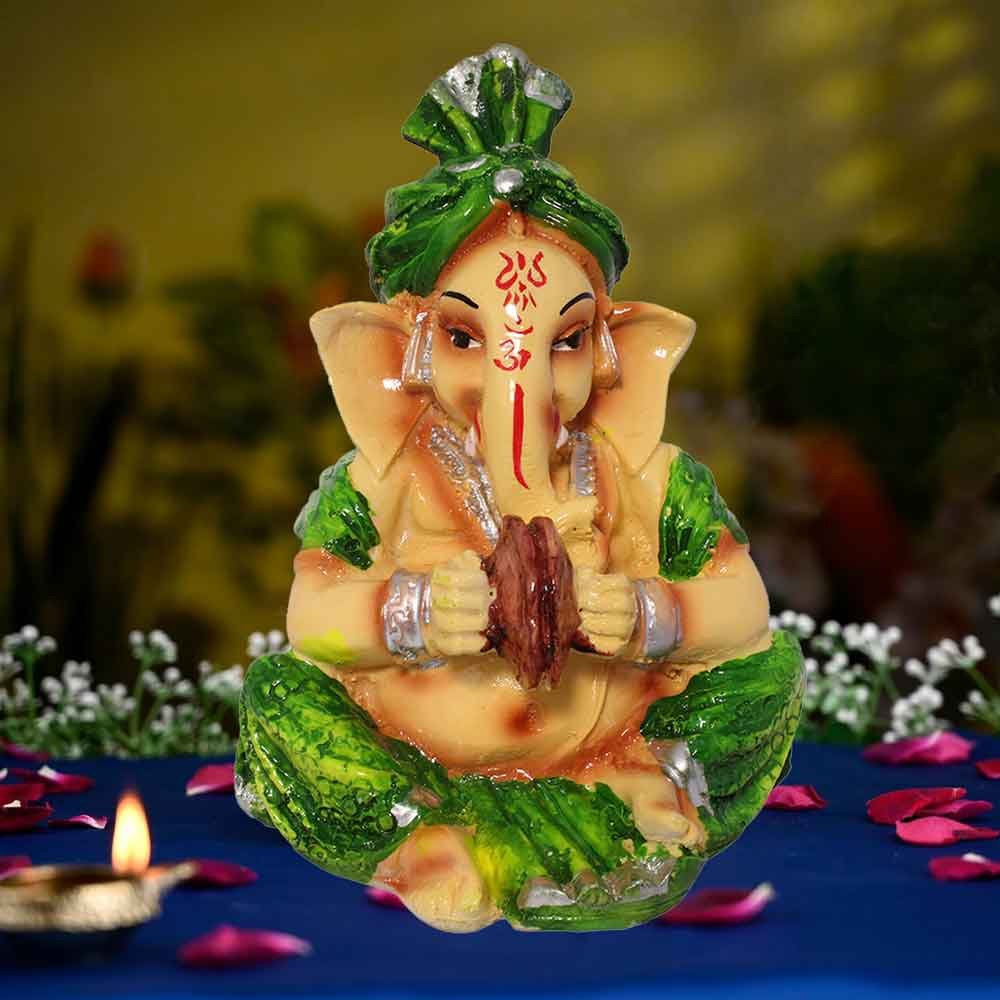 Musical Ganesha Idol for table decoration 12 cm G71GX0085M000XZAS